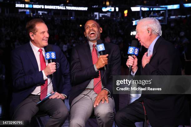 Sportscasters Jim Nantz, Grant Hill and Bill Raftery look on prior to the Big Ten Basketball Tournament Championship between the Purdue Boilermakers...
