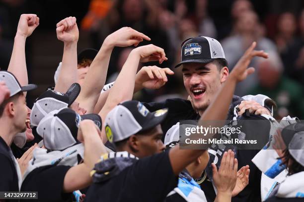 Zach Edey of the Purdue Boilermakers celebrates after defeating the Penn State Nittany Lions in the Big Ten Basketball Tournament Championship game...