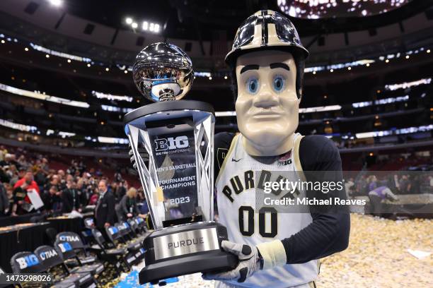 Purdue Pete poses with the trophy after the Big Ten Basketball Tournament Championship game between the Purdue Boilermakers and the Penn State...