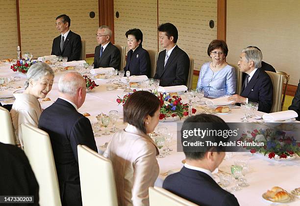Japanese Emepror Akihito speaks to Silvia, wife of Slovak President Ivan Gasparovic, Empress Michiko and , his wife Silvia while Empress Michiko and...