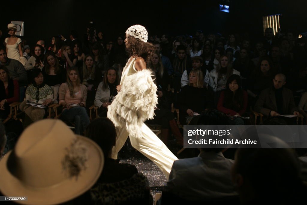 A model walks down the runway at the Fall 2005 J Lo show in New York ...