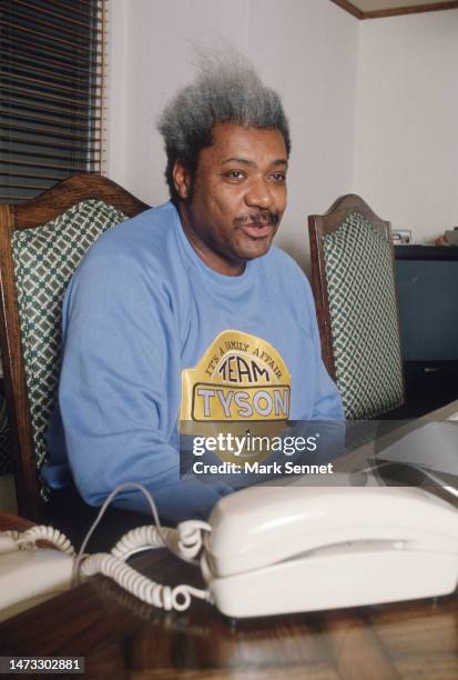 Heavyweight Boxing Manager Don King poses for a portrait at at his desk in 1989 in Las Vegas, Nevada