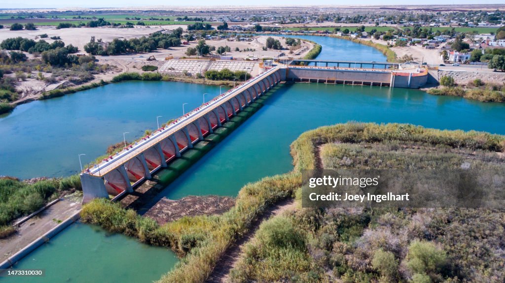 Drone View of the Colorado Diversion Dam River Drainage at International Barrier Between Yuma Arizona and Algodones Near the International Border Wall, Baja California Norte Mexico on a Sunny Day