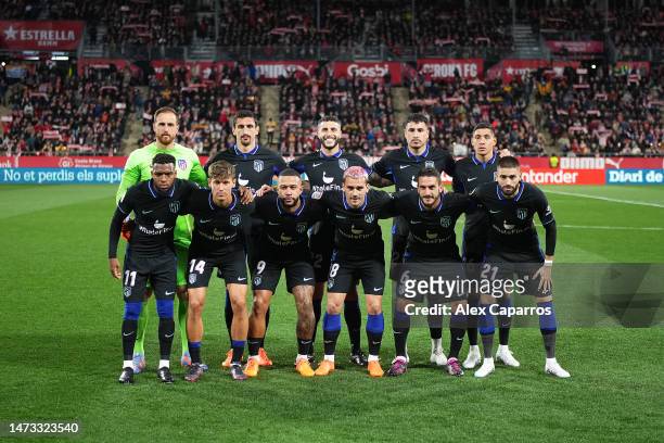 Atletico Madrid players pose for a photo on pitch prior to the LaLiga Santander match between Girona FC and Atletico de Madrid at Montilivi Stadium...