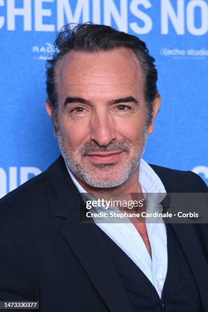 Jean Dujardin attends the ""Sur Les Chemins Noirs" premiere at Cinema UGC Normandie on March 13, 2023 in Paris, France.