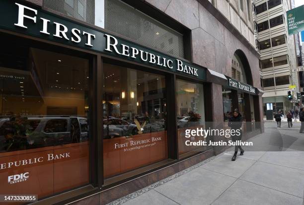 Pedestrian walks by the First Republic Bank headquarters on March 13, 2023 in San Francisco, California. First Republic shares lost over 60 percent...