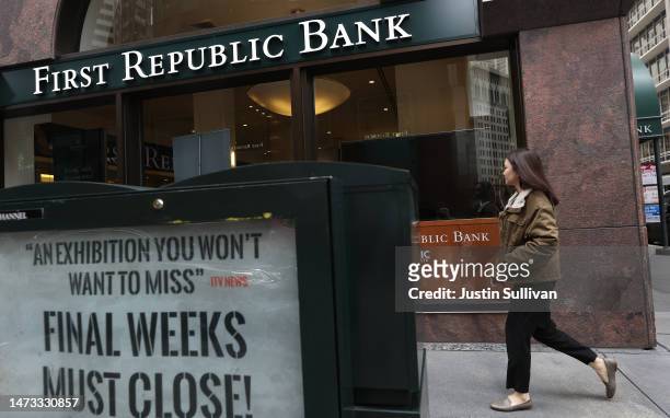 Pedestrian walks by the First Republic Bank headquarters on March 13, 2023 in San Francisco, California. First Republic shares lost over 60 percent...