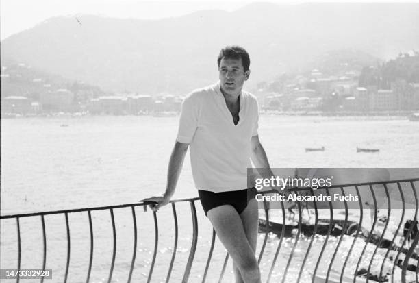 Actor Rock Hudson Resting near the oceat at Portofino, Italy, in 1960.