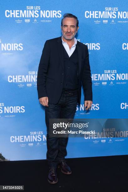 Jean Dujardin attends the ""Sur Les Chemins Noirs" premiere at Cinema UGC Normandie on March 13, 2023 in Paris, France.