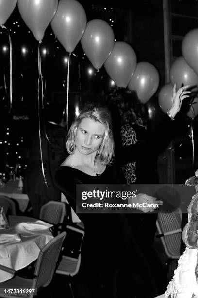 English-born American actress and award-winning star of Knot's Landing Nicollette Sheridan thanks her guests while standing next to her cake at her...