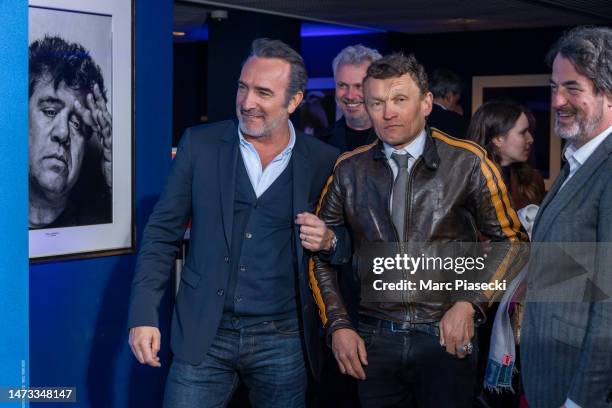 Jean Dujardin, Sylvain Tesson and Denis Imbert attend the ""Sur Les Chemins Noirs" premiere at Cinema UGC Normandie on March 13, 2023 in Paris,...