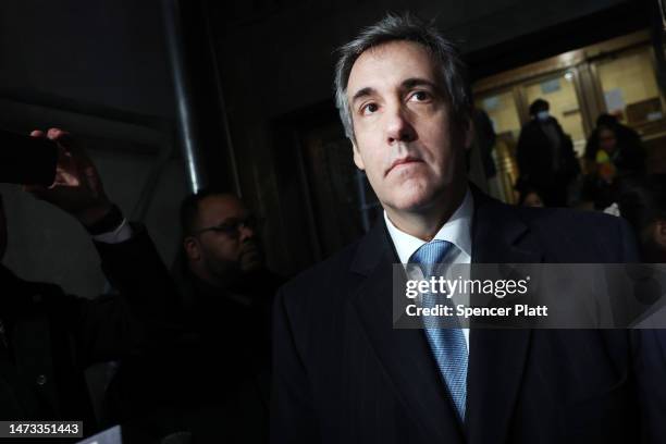 Former Donald Trump lawyer and loyalist Michael Cohen walks out of a Manhattan courthouse after testifying before a grand jury on March 13, 2023 in...