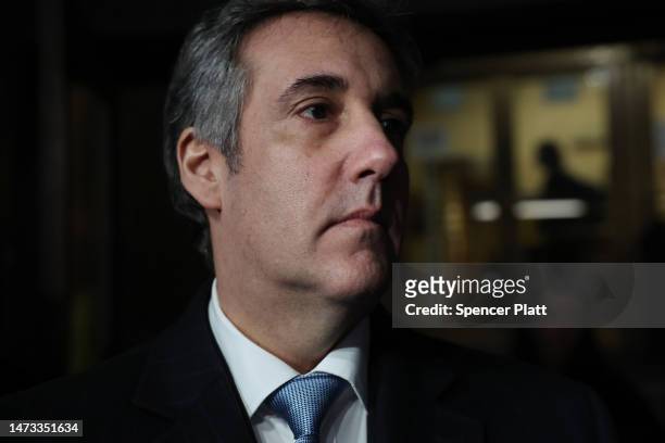 Former Donald Trump lawyer and loyalist Michael Cohen walks out of a Manhattan courthouse after testifying before a grand jury on March 13, 2023 in...