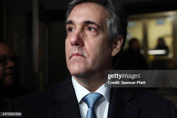 Former Donald Trump lawyer and loyalist Michael Cohen walks out of a Manhattan courthouse after testifying before a grand jury on March 13, 2023 in...