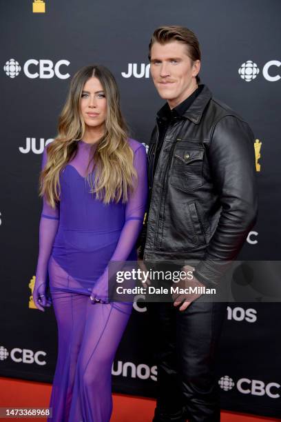 Jenna Walker and Stuart Walker of The Reklaws attends the 2023 JUNO Awards at Rogers Place on March 13, 2023 in Edmonton, Alberta.