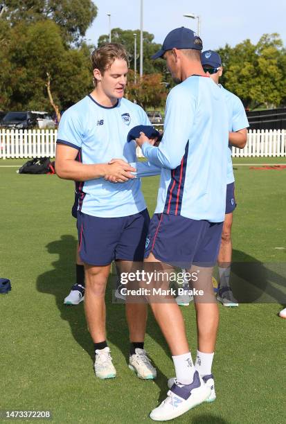Blake McDonald of the Blues receives his debut cap before start of the Sheffield Shield match between South Australia and New South Wales at Karen...