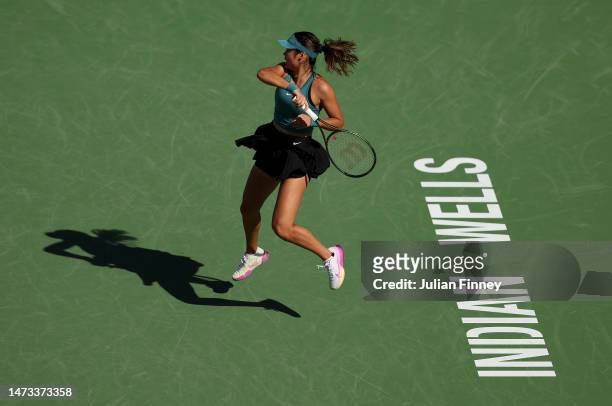 Emma Raducanu of Great Britain in action against Beatriz Haddad Maia of Brazil during the BNP Paribas Open on March 13, 2023 in Indian Wells,...