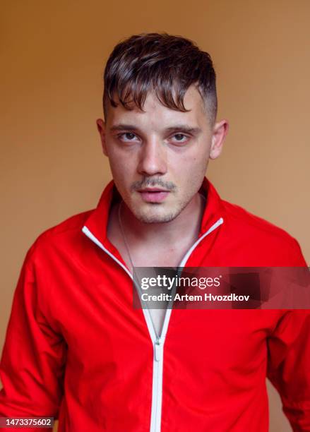 serious hooligan with funny hairstyle - eastern european 個照片及圖片檔