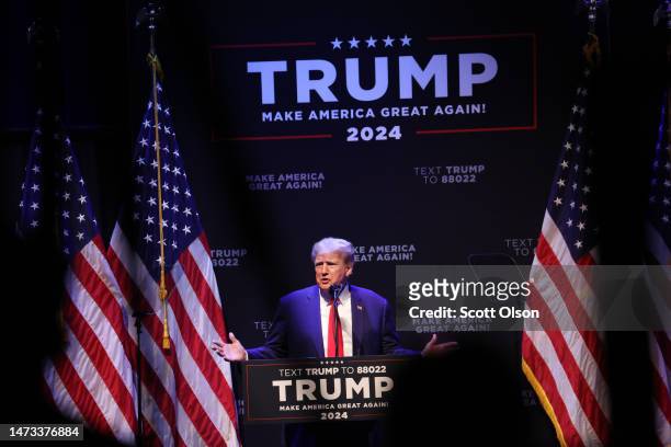 Former President Donald Trump speaks to guests gathered for an event at the Adler Theatre on March 13, 2023 in Davenport, Iowa. Trump's visit follows...