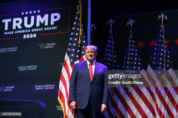 Former President Donald Trump arrives for an event at the Adler Theatre on March 13, 2023 in Davenport, Iowa. Trump's visit follows those by...