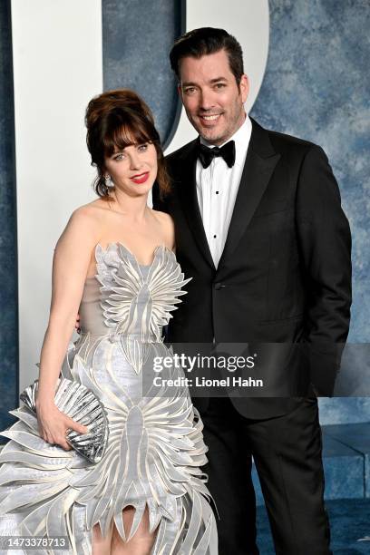 Jonathan Scott and Zooey Deschanel attend the 2023 Vanity Fair Oscar Party Hosted By Radhika Jones at Wallis Annenberg Center for the Performing Arts...