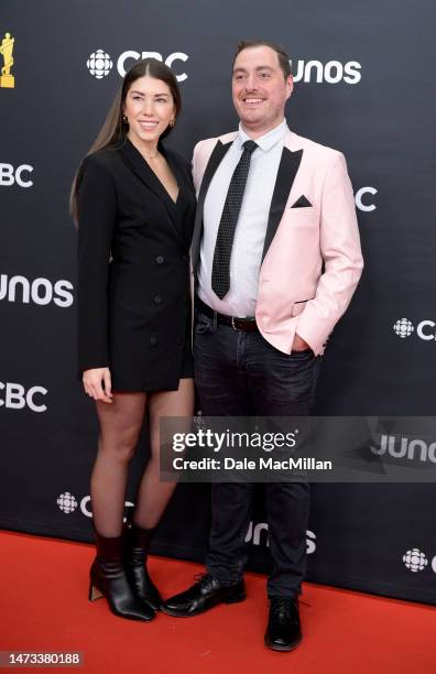 Matt Wright and guest attend the 2023 JUNO Awards at Rogers Place on March 13, 2023 in Edmonton, Alberta.