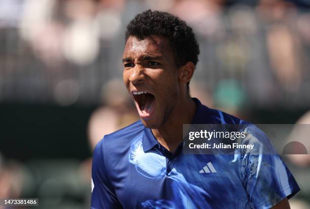 Felix Auger-Aliassime of Canada celebrates defeating Francisco Cerundolo of Argentina during the BNP Paribas Open on March 13, 2023 in Indian Wells,...