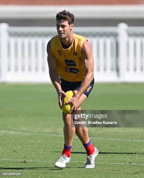 Josh Dunkley lines up a kick during a Brisbane Lions AFL training session at Brighton Homes Arena on March 14, 2023 in Ipswich, Australia.