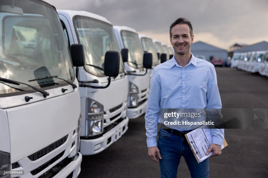 Car salesperson selling trucks at a car dealership