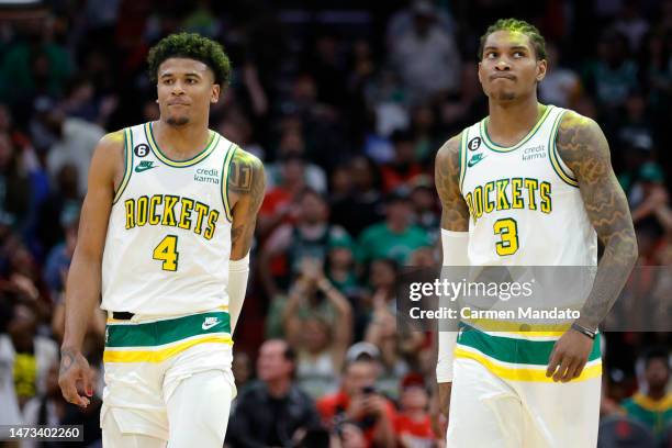 Kevin Porter Jr. #3 and Jalen Green of the Houston Rockets look on against the Boston Celtics during the second half at Toyota Center on March 13,...