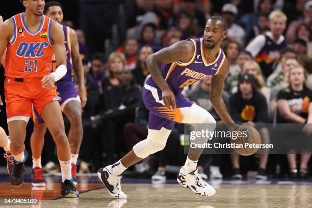 Terrence Ross of the Phoenix Suns handles the ball against the Oklahoma City Thunder during the second half of the NBA game at Footprint Center on...