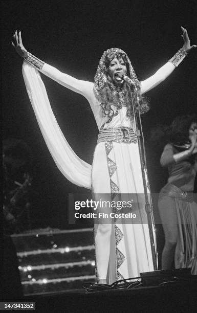 1st FEBRUARY: American singer Donna Summer performs live on stage at Radio City Music Hall in New York in February 1976.