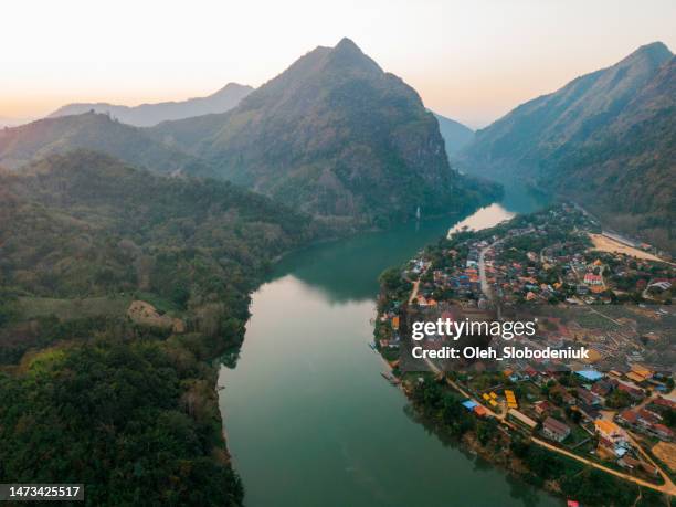 aerial view of tranquil scene of mekong river at sunset - vientiane stock pictures, royalty-free photos & images