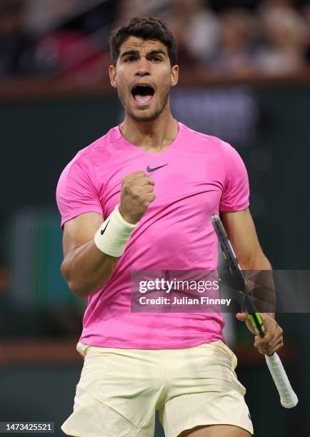 Carlos Alcaraz of Spain celebrates in his match against Tallon Griekspoor of Netherlands during the BNP Paribas Open on March 13, 2023 in Indian...