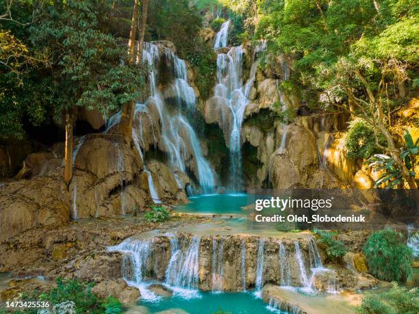 aerial view of refreshing  kuang si waterfall in the jungles - luang prabang stock pictures, royalty-free photos & images