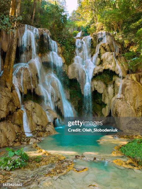 aerial view of refreshing  kuang si waterfall in the jungles - vang vieng stockfoto's en -beelden