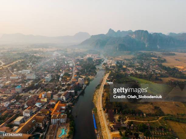 aerial view of tranquil scene of mekong river at sunset - vientiane stock pictures, royalty-free photos & images