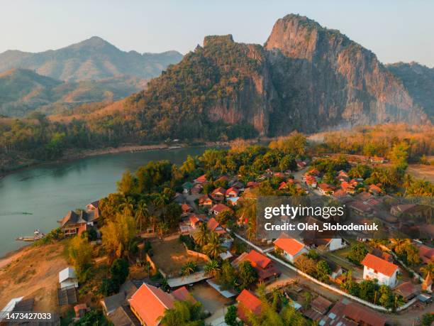 aerial view of luang prabang town and mekong river - asia village river bildbanksfoton och bilder