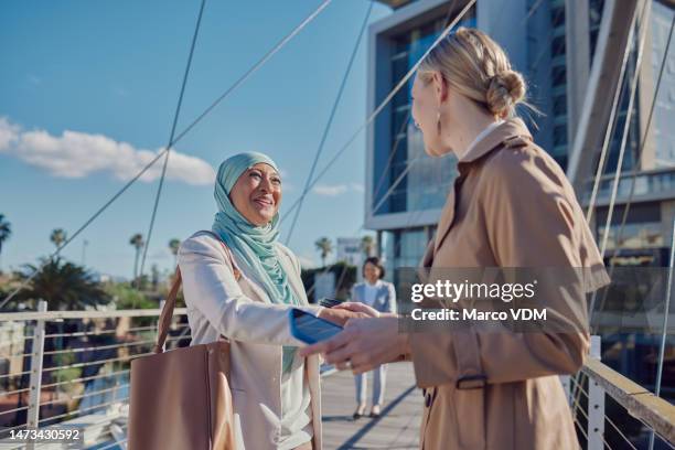women, handshake or city meeting for planning property, real estate partnership or hotel development deal. smile, happy or real estate agent shaking hands in teamwork, collaboration or thank you with muslim - hotel confirmation stock pictures, royalty-free photos & images