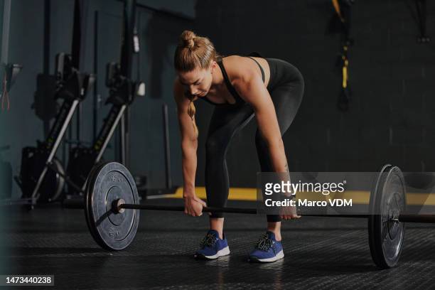 bodybuilding, weightlifting and woman in gym with barbell, strong and muscle training with fitness and power. energy, challenge and active lifestyle with healthy female, bodybuilder and exercise - crossfit imagens e fotografias de stock