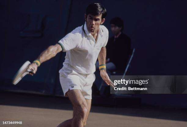 Australian tennis player Ken Rosewall competes in the men's singles final at the Japan Open Tennis Championships in Tokyo, Japan, on October 14th,...