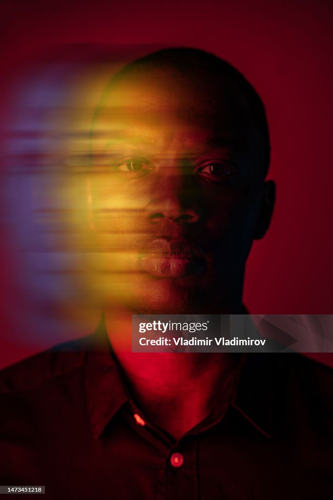 Blurred headshot of mans face