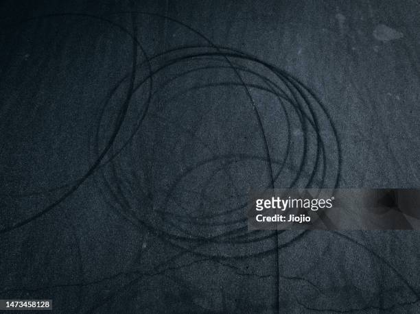 racing track covered with tire marks - skid marks stock pictures, royalty-free photos & images
