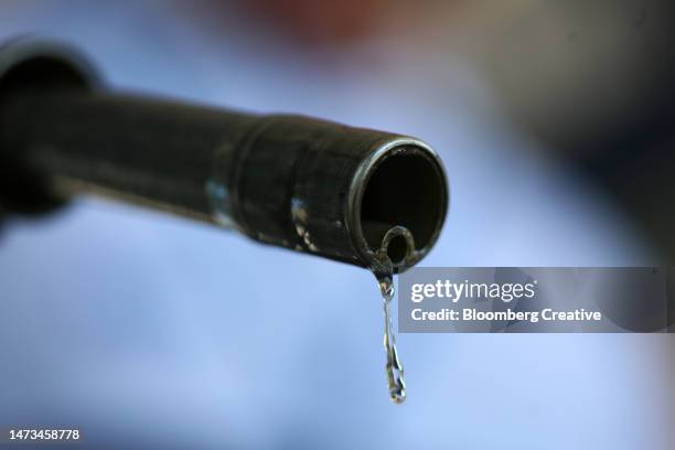 gasoline drips from a fuel pump - rijeka croatia stock pictures, royalty-free photos & images