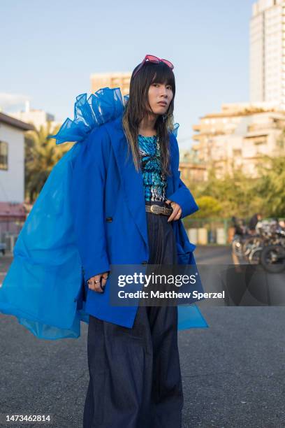 Guest is seen wearing blue tulle jacket attending UCF in Minamiaoyama at Rakuten Fashion Week TOKYO 2023 A/W on March 14, 2023 in Tokyo, Japan.