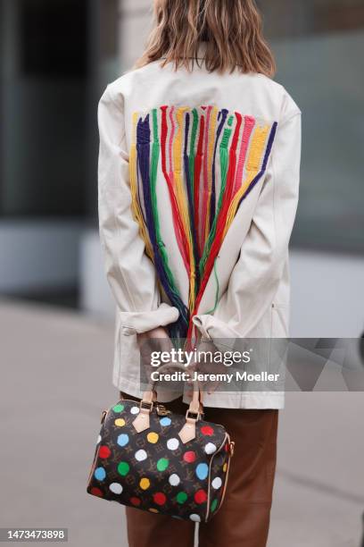 Karin Teigl seen wearing Gestuz brown leather pants, Palm Angels x Missoni cream white denim jacket with colorful fringed back details, Louis Vuitton...