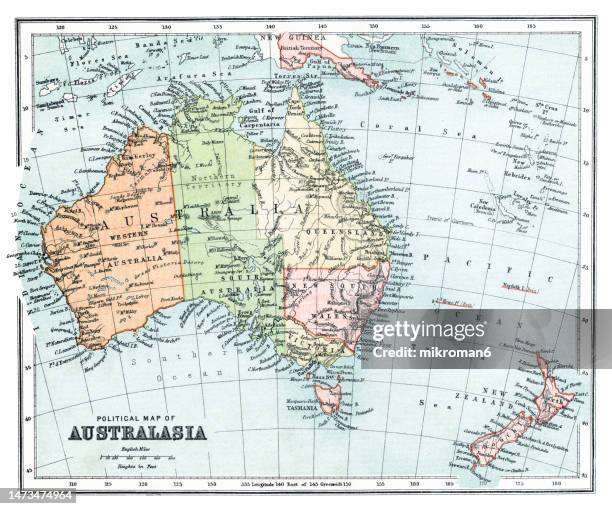old chromolithograph map of australasia (australia, new zealand, the island of new guinea, and neighbouring islands in the pacific ocean) - new zealand map stock-fotos und bilder