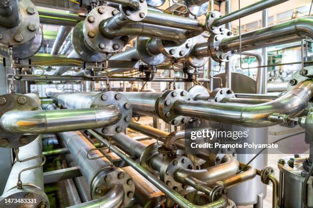 stainless steel pipes in the factory. construction on food production, food industry. - milk production line stock pictures, royalty-free photos & images