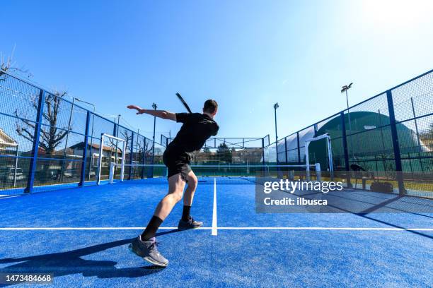 young people playing padel tennis - pudel stock pictures, royalty-free photos & images