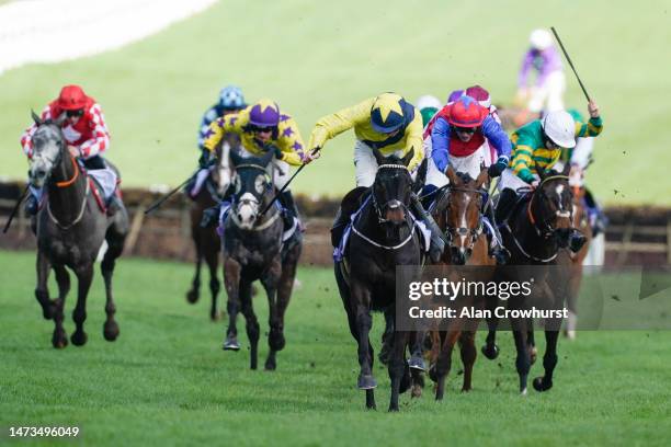 Michael O'Sullivan riding Marine Nationale clear the last to win The Sky Bet Supreme Novices' Hurdle during day one of the Cheltenham Festival 2023...